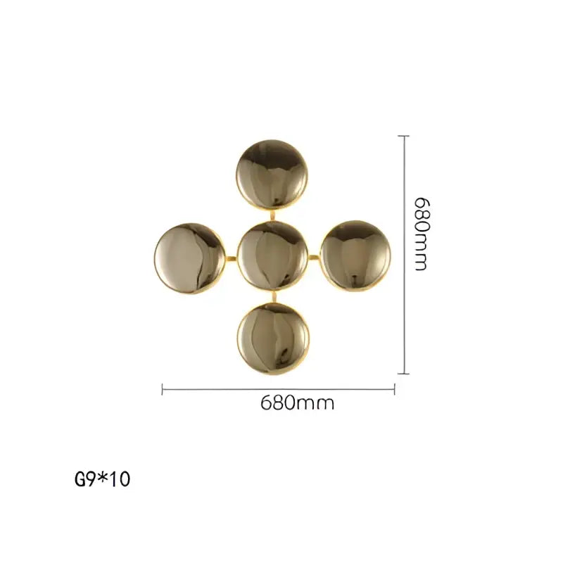 Modern geometric glossy gold led wall sconces featuring five polished gold-toned spheres in a cross arrangement