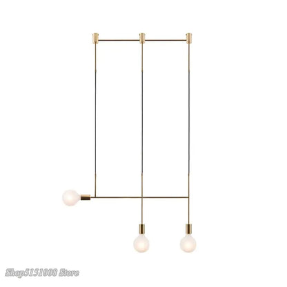 Modern geometric iron pendant light brass and black with three frosted glass bulbs for dining room decorbites geometric iron pendant