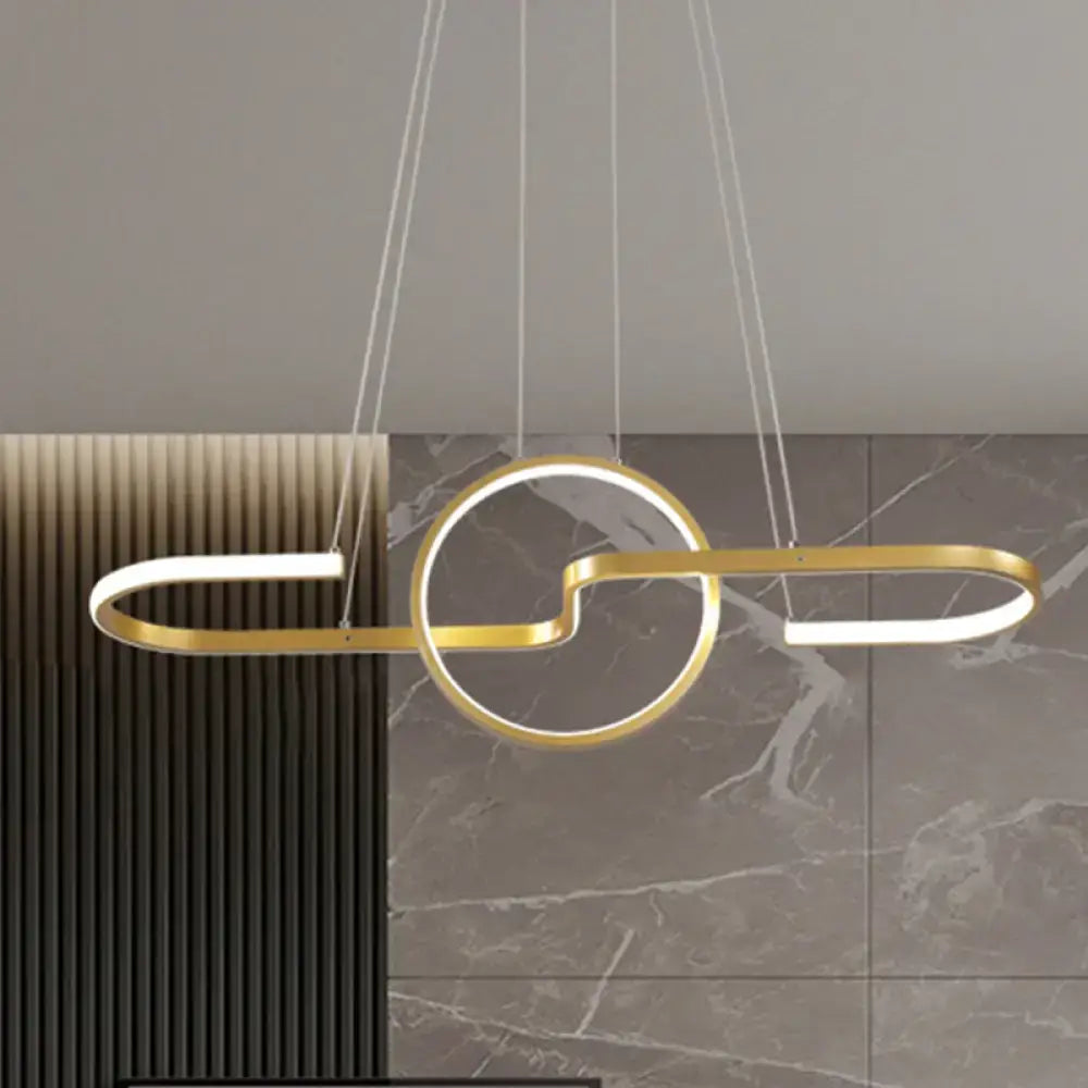 Gold-toned black gold DecorBites™ modern geometric pendant light with sleek interlocking circles and warm white light kit