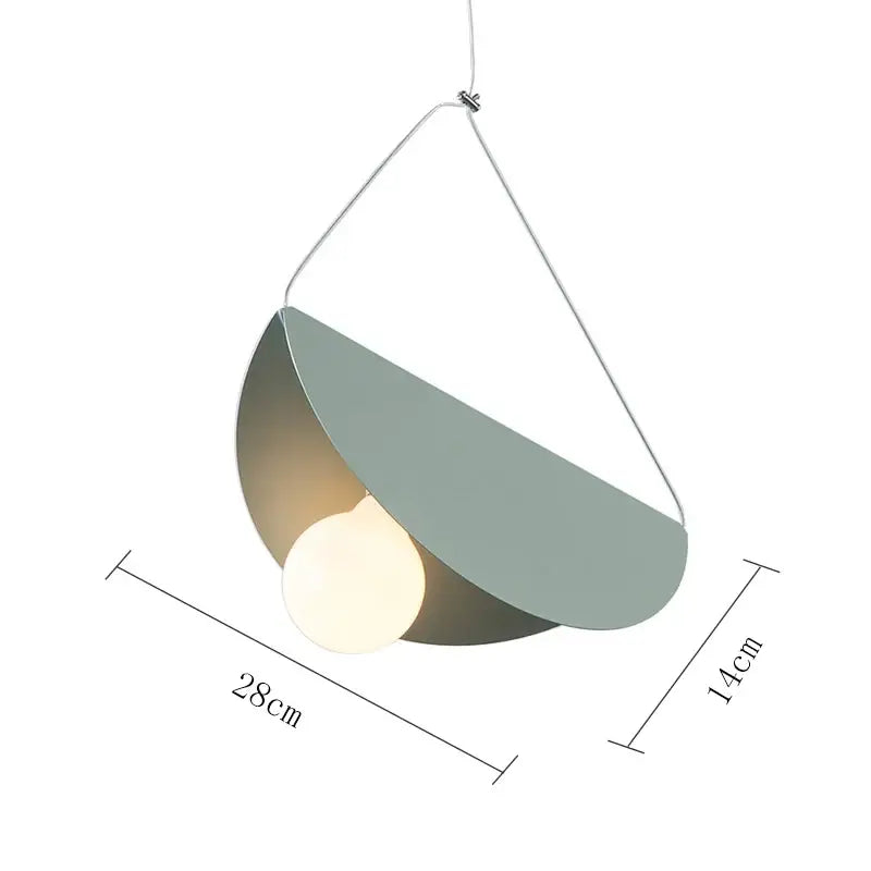 Modern geometric led pendant light with matte sage green metal shade and warm bulb for dining room decorbites geometric led