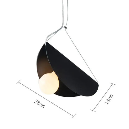 Black matte geometric led pendant light with two curved panels and warm bulb for modern dining room decorbites design
