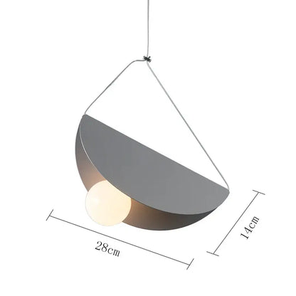 Modern geometric led pendant light with a sleek half-moon metallic shade and warm bulb for dining room decorbites geometric led