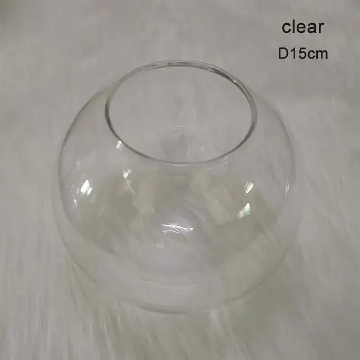 Clear glass fishbowl with rounded design and 15cm diameter featured in modern geometric magic bean lighting smoke and amber globe