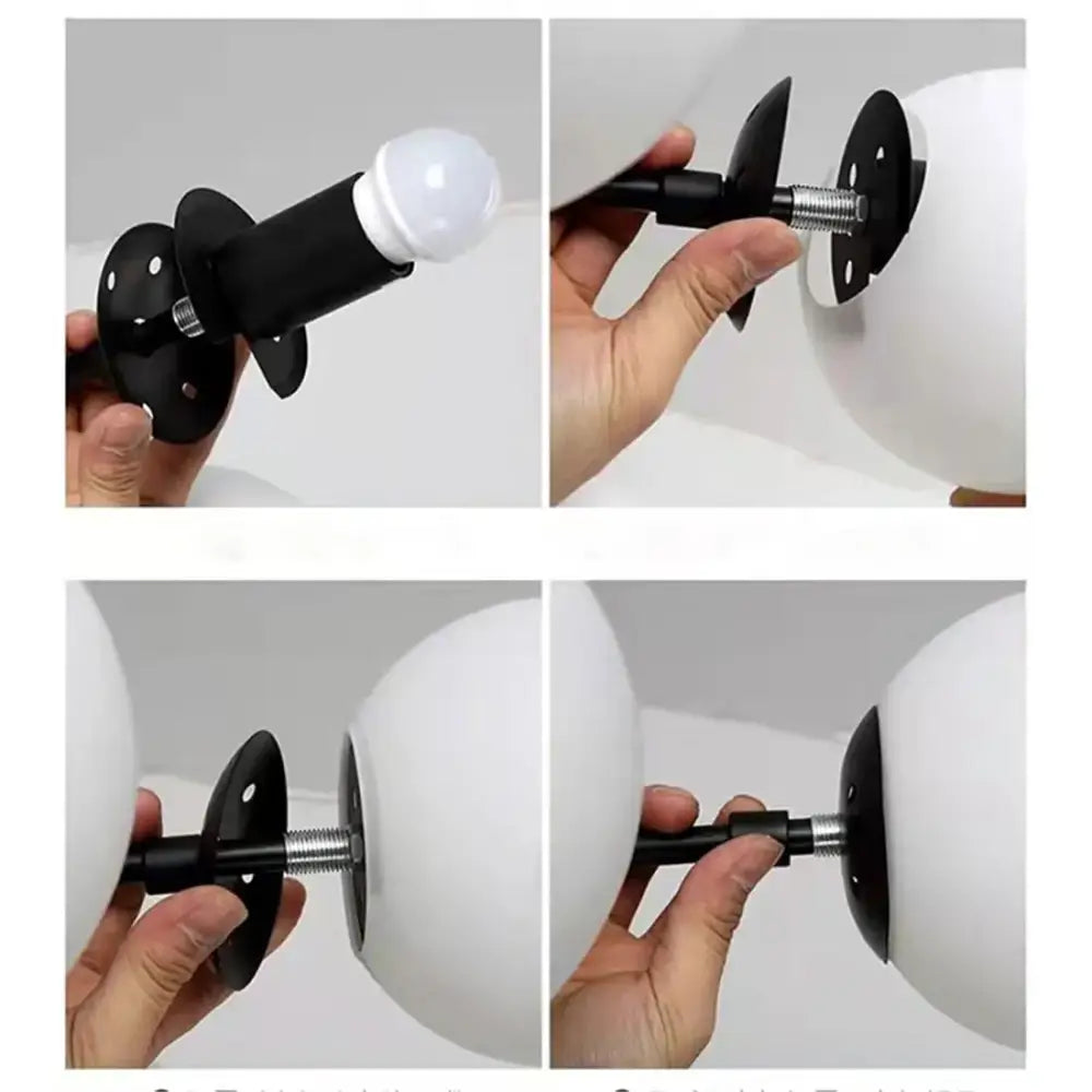 White spherical globe lamp with black metal mounting bracket and screw assembly from modern geometric magic bean lighting