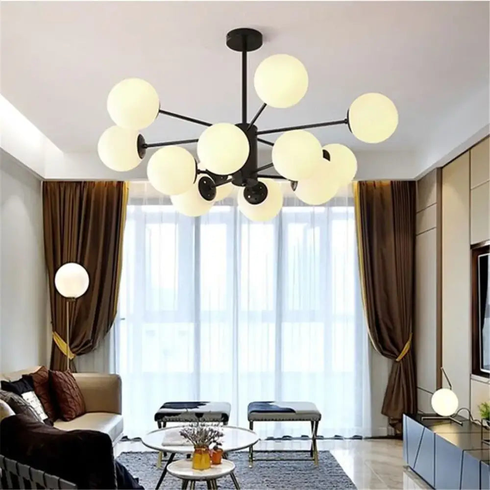 Modern black metal chandelier with frosted glass globe lights for dining room featuring magic bean lighting design