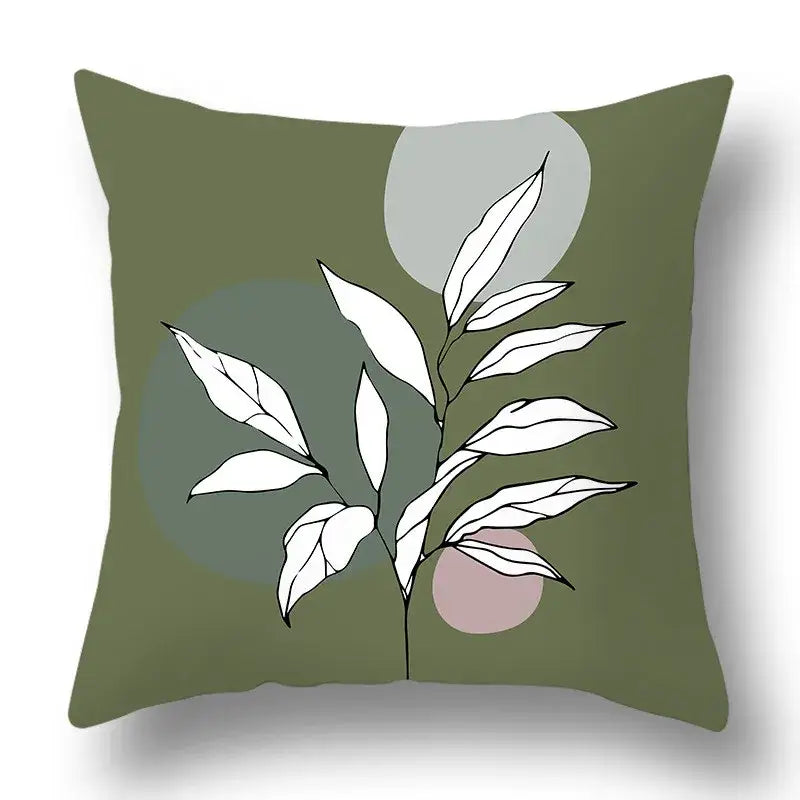 Olive green pillow cover with minimalist white leaf and geometric print decorbites green plants for living room decor