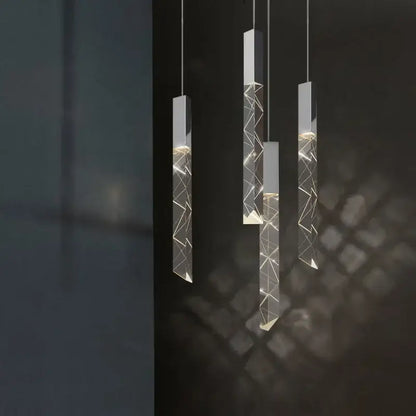 Modern geometric silver crystal glass led pendant light with clear acrylic body and warm internal lighting for dining room decorbites crystal glass
