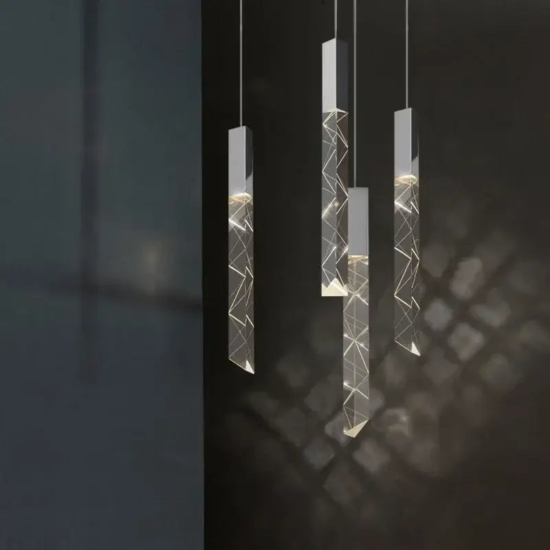 Modern geometric silver crystal glass led pendant light with clear acrylic body and warm internal lighting for dining room decorbites crystal glass
