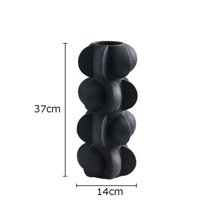 Black matte ceramic vase with segmented rounded design for modern geometric spiral resin living room decorbites decor
