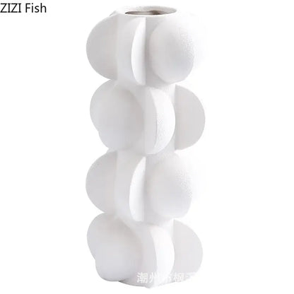 White ceramic vase with modern segmented stacked circular design in decorbites geometric spiral resin style for living room decor