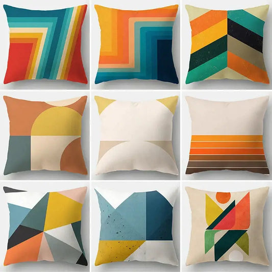 Set of nine modern geometric stripe patchwork pillow cases with bold colorful abstract patterns on soft fabric