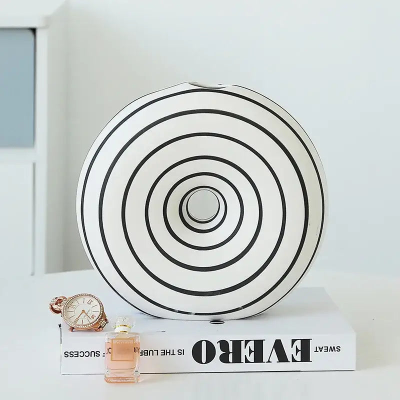 White ceramic vase with concentric black geometric stripes for decorbites geometric stripes ceramic living room decor