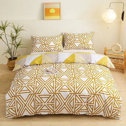 White duvet cover with gold geometric triangle block print as part of modern bedding set for bedroom use