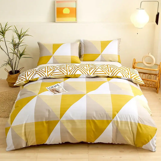 Modern geometric triangle block print bedding set featuring yellow white and gray duvet cover with triangle block print design