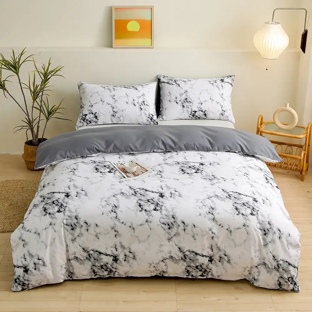 White and black marble-patterned geometric triangle block print bedding set with solid gray comforter for bedroom
