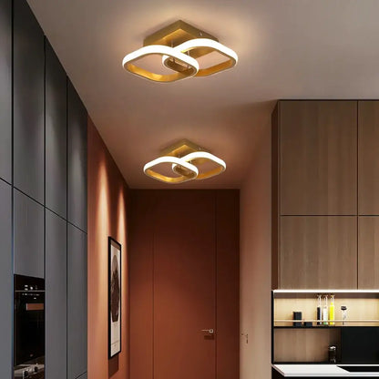 Modern geometric ceiling lamp with gold-finished acrylic led intertwined ring design for bedroom decorbites acrylic led ceiling