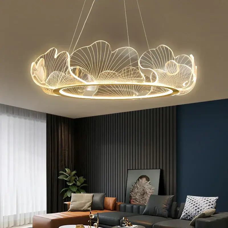 Modern gold-toned decorbites ginkgo gold acrylic pendant light with intricate leaf-shaped wireframe design for dining room decor