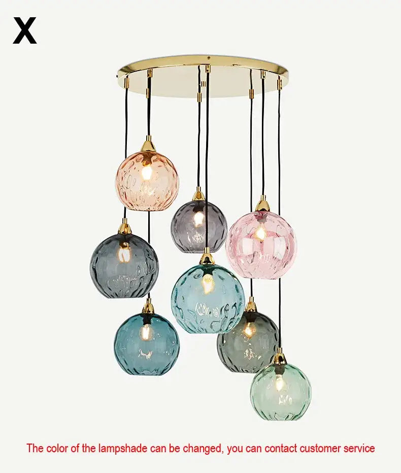 Modern glass ball lustre pendant lights with seven pastel pink blue and gray textured glass globes on gold mount