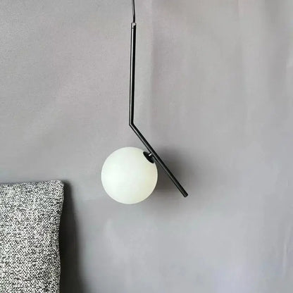 Minimalist black metal pendant light with frosted white glass ball globe for modern decorbites glass ball pendant lighting