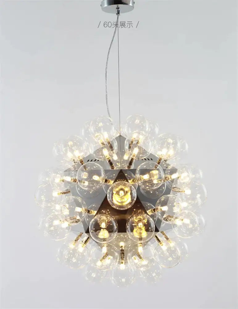 A modern decorbites glass bubble led hanging lamp with a central triangular frame and warm glass bubble led bulbs