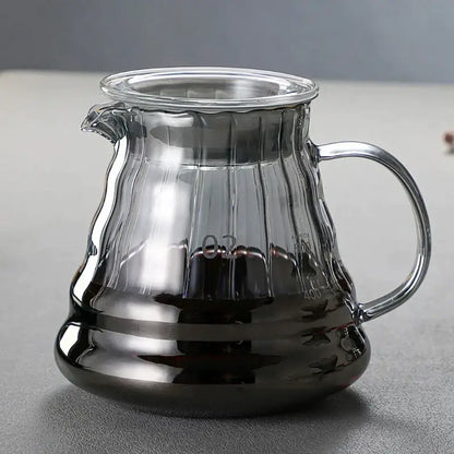 Modern glass coffee carafe with fluted ribbed clear glass body and metallic handle for decorbites glass coffee use