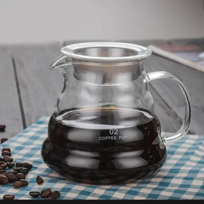 Modern glass coffee pot with stainless steel coffee pot lid and handle marked 02 for kitchen dining use