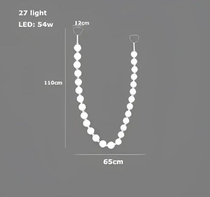 A sleek white led string light with 27 bulbs in a curved design for modern decorbites glass gold pendant light