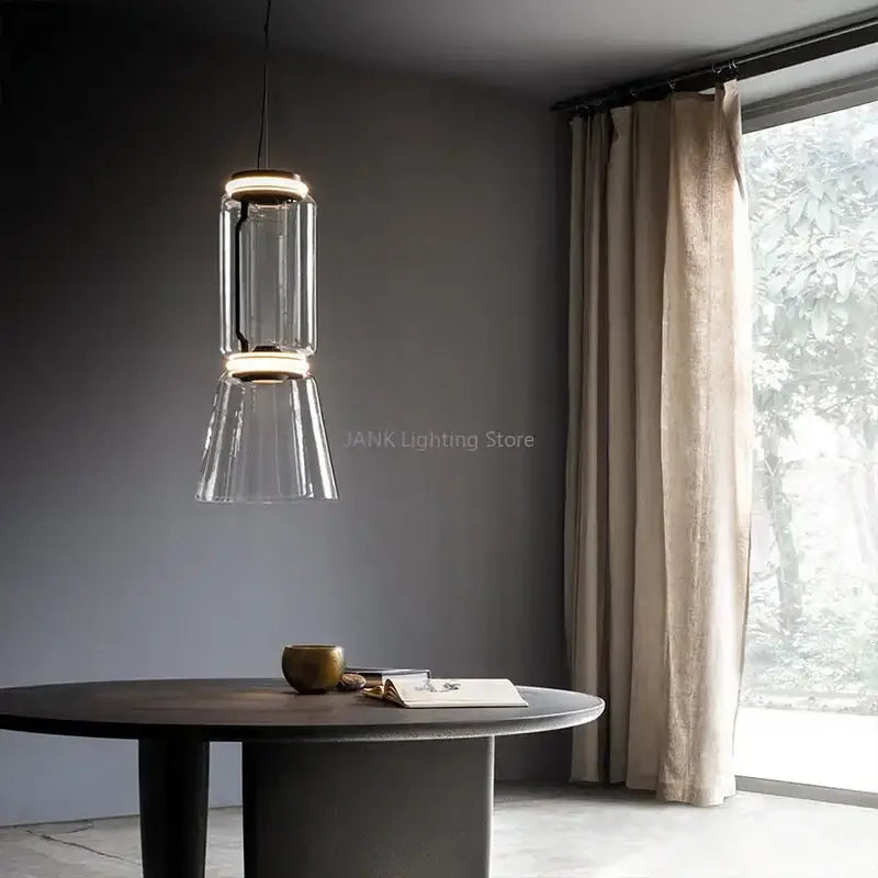 Modern glass led floor lamp with sleek cylindrical pendant light and warm metallic accents for living room use