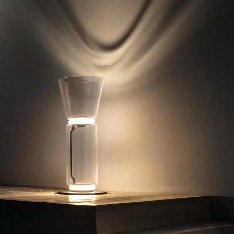 Modern glass led floor lamp with sleek cylindrical design and warm diffused glow for living room lighting