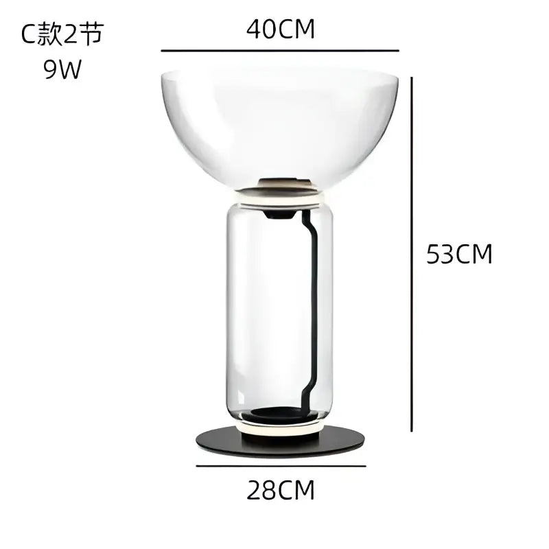Modern glass led floor lamp with a clear glass bulbous top and cylindrical base featuring glowing rings for living room