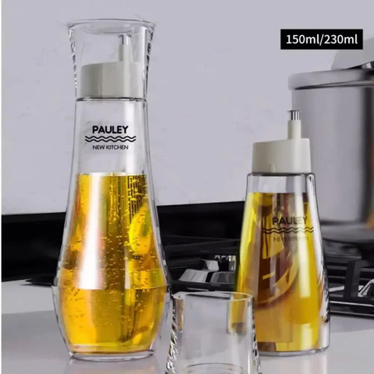 Modern glass seasoning bottle set with clear glass oil dispenser and white pump top in 150ml and 230ml capacity