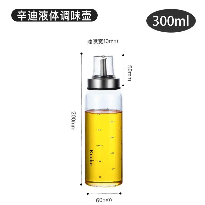 Modern glass seasoning storage bottle of 300ml with transparent glass body and silver metal pump for kitchen organization