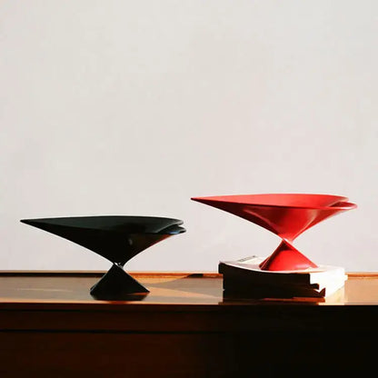 Black and red ceramic serving bowls with sleek modern geometric designs for decorbites geometric fruit display