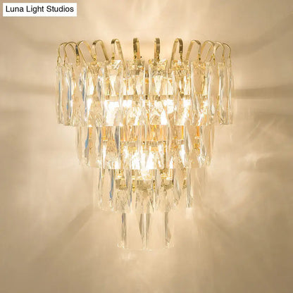 Modern gold tiered crystal chandelier with gold-toned metal arms and faceted prisms for e12 e14 bulb base 220v-240v