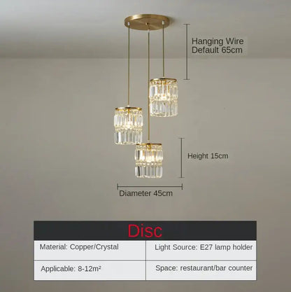 Modern gold chandelier pendant light with three cascading crystal tiers suspended by copper wires for dining room
