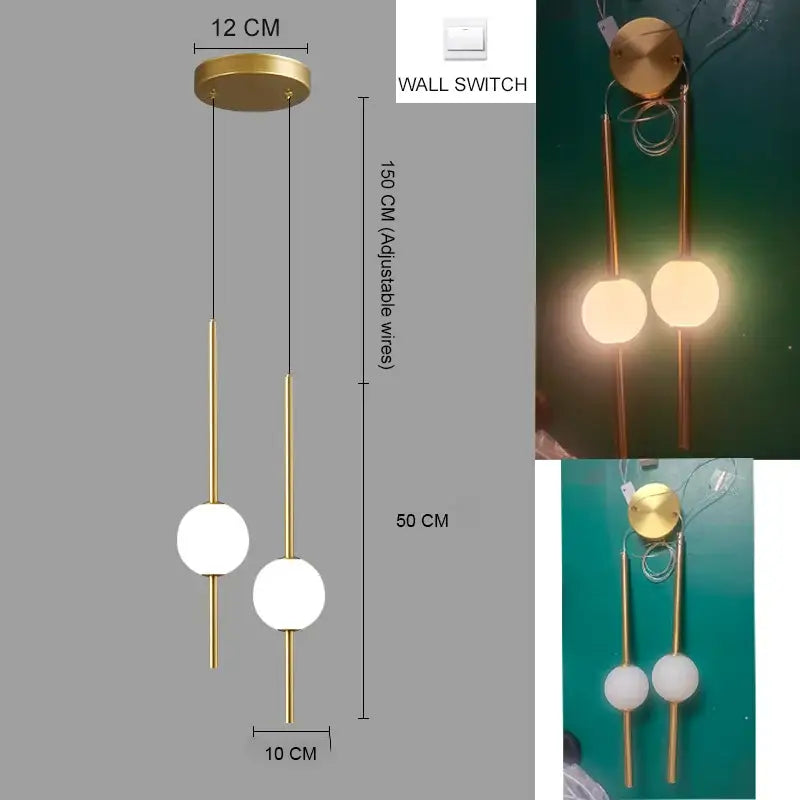 Modern gold 4 globe pendant light with plated gold-toned surface and frosted glass shades as a dining room focal point