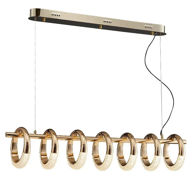 Modern gold acrylic led pendant lights featuring six interconnected textured glass rings for dining room lighting