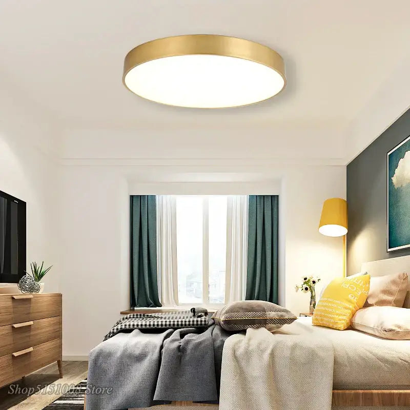 Modern gold acrylic led ceiling light with circular gold-toned design for living room illumination