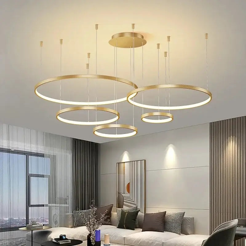 Modern gold acrylic led ring pendant light with multiple concentric rings for dining room decorbites acrylic led decor