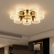 Modern gold acrylic lustre chandelier with multiple warm glowing concentric rings for stylish living room decorbites acrylic lustre