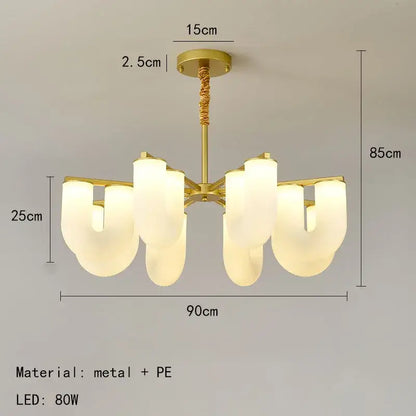 Modern gold metal pendant lights with six frosted white acrylic shades in an asymmetrical dining room design