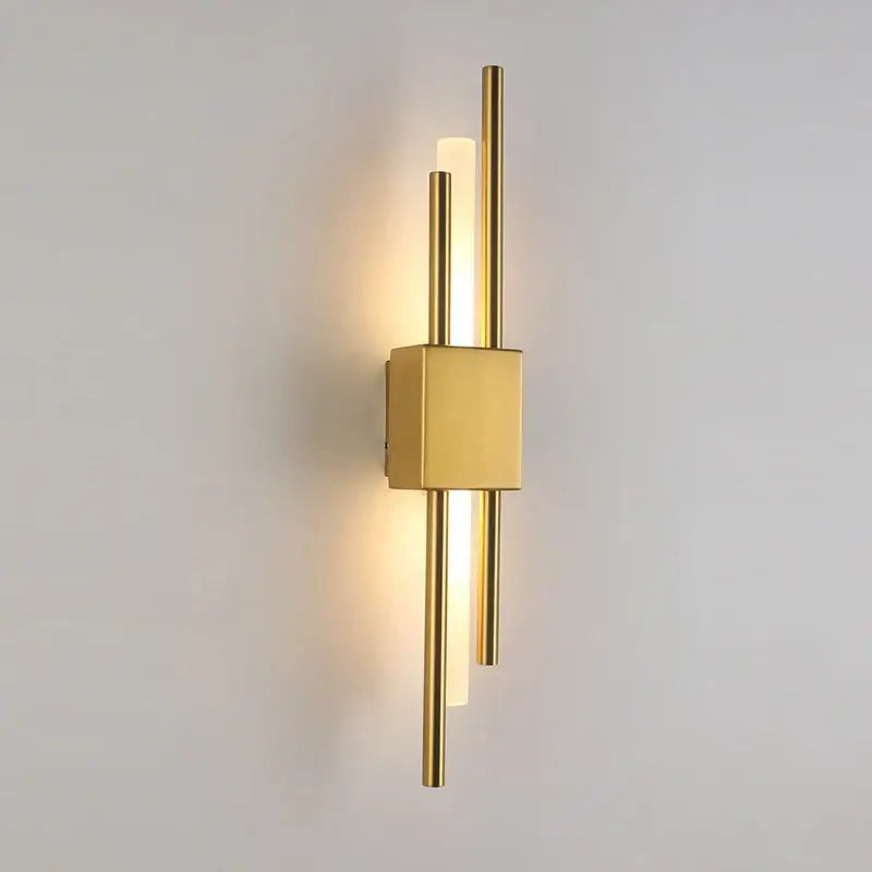Modern gold acrylic pipe led wall lamp with sleek vertical rods and warm ambient lighting wall sconce for bedroom