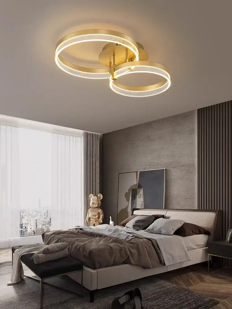 Modern gold acrylic round ring ceiling light with illuminated rings and sleek minimalist design for living room decorbites acrylic round