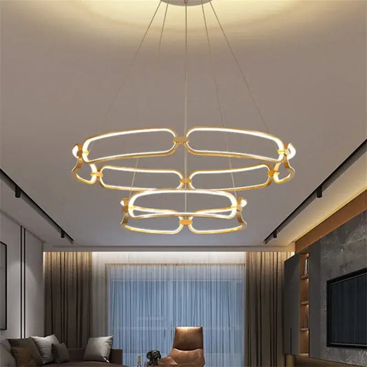 Modern gold adara luxury led chandelier with three concentric illuminated rings for dining room decorbites adara luxury