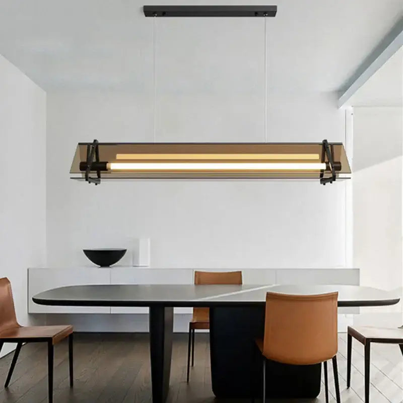 Modern gold amber led pendant lamp with sleek black metal frame amber tinted glass panels for dining room decorbites amber led