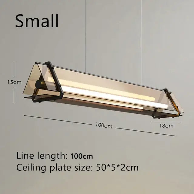 Modern gold amber led pendant lamp with black metal frame and transparent glass panels for dining room decorbites amber led