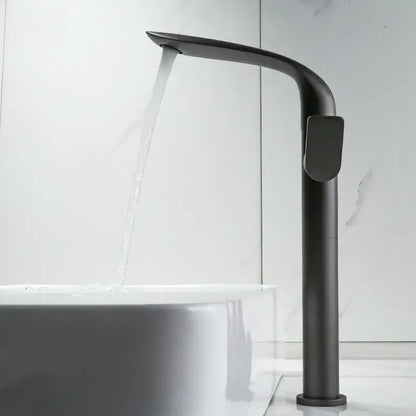 Modern gold and black decorbites basin faucet with matte black finish and sleek curved tall cylindrical design