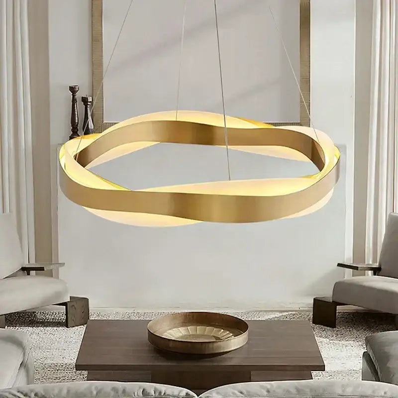 Modern gold and black circle chandelier pendant light with sleek intertwined ring design for dining room decorbites black circle