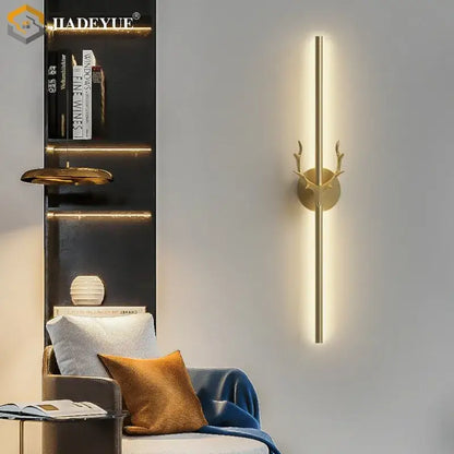 Modern gold and black wall lamp with gold-toned deer horn led light bar for bedroom decorbites deer horn decor