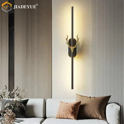 Modern gold and black deer horn led wall lamp featuring a gold-toned antler design with a sleek black metal rod decorbites deer horn